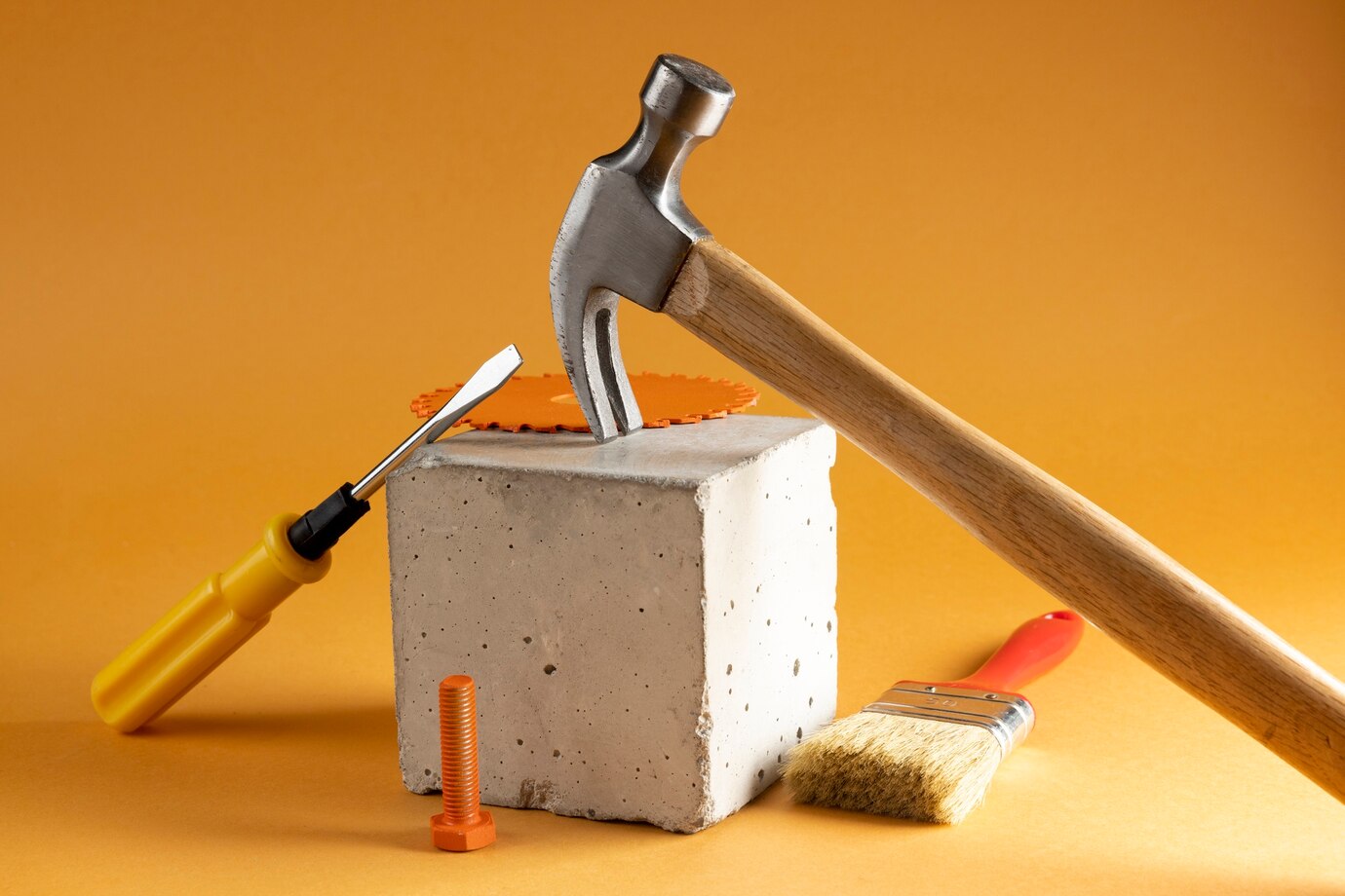 construction hammer in a yellow background